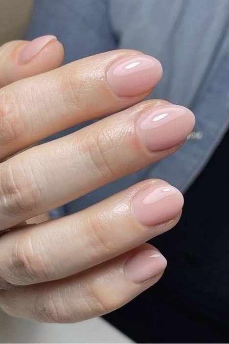 Pink nude nails with diamond ring