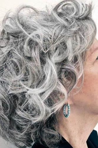 Curly silver pixie bob with rounded shape