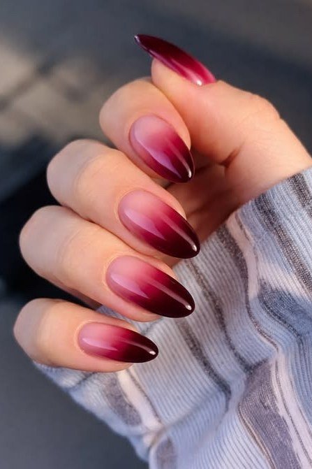 Burgundy ombre almond nails for women over 50