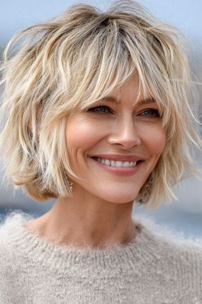 Happy Blonde Choppy Shag - shaggy bob haircut for women over 60