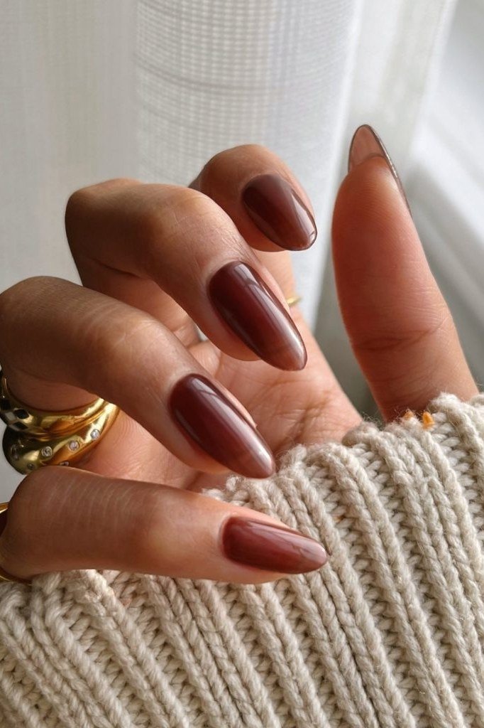 Chocolate Brown Almond Nails with a Cream Sweater - old money fall nail color for women over 40