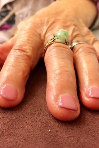 Coral Pink Short Square on Older Hands gel nails for women over 60