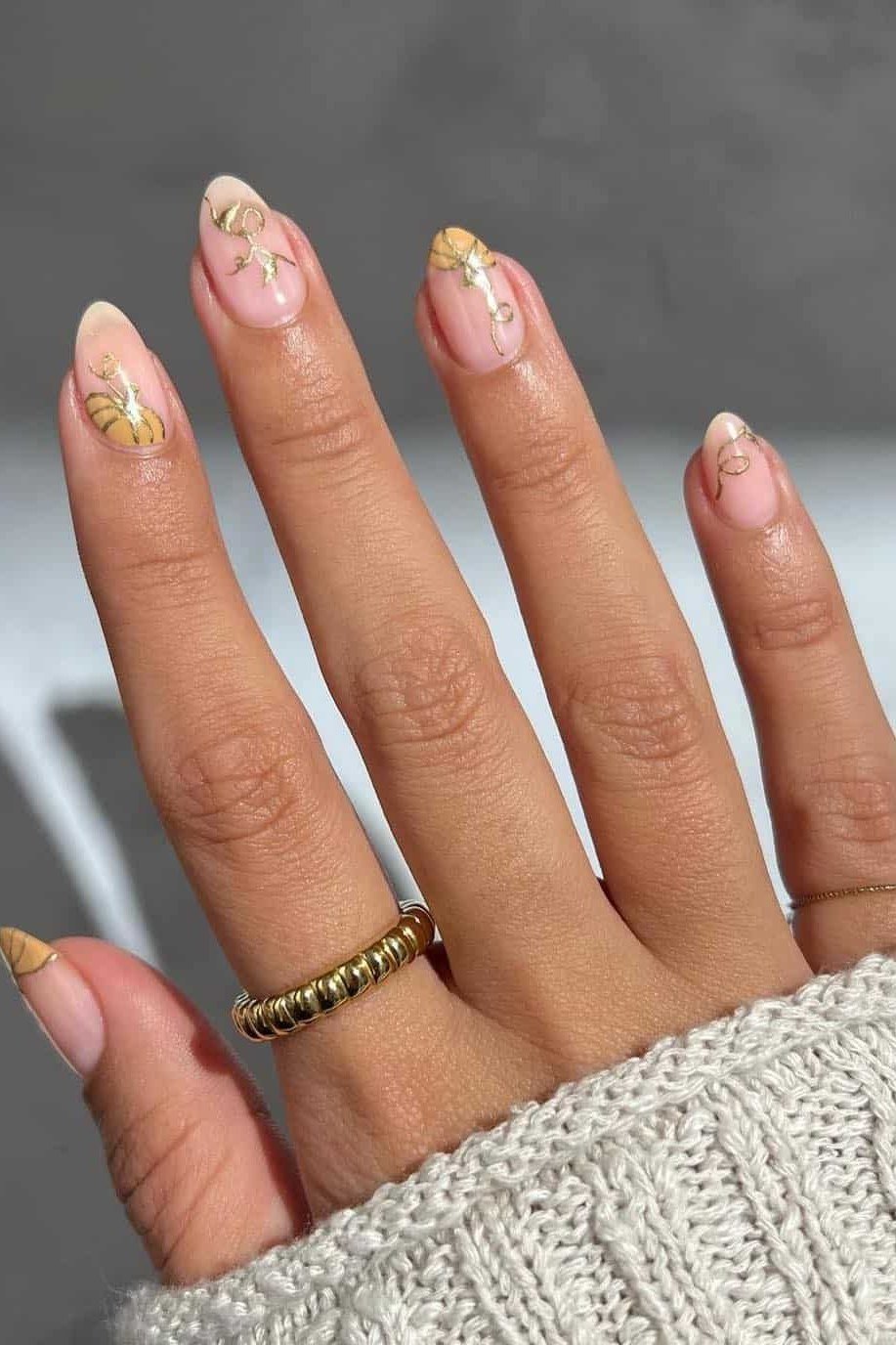 28. Gold and Copper Floral Line Art - Thanksgiving nail art idea for women over 50