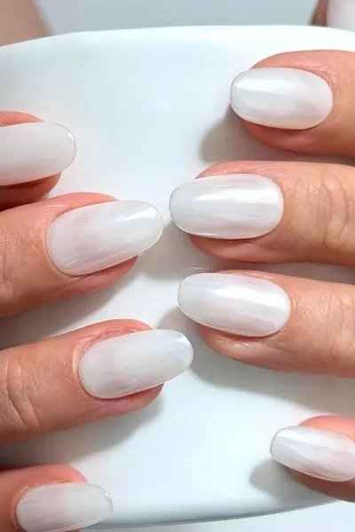 Milky White Nails with Mug, understated glam nail color for women over 60