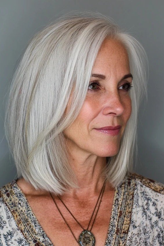 bright silver lob with center part for women over 50