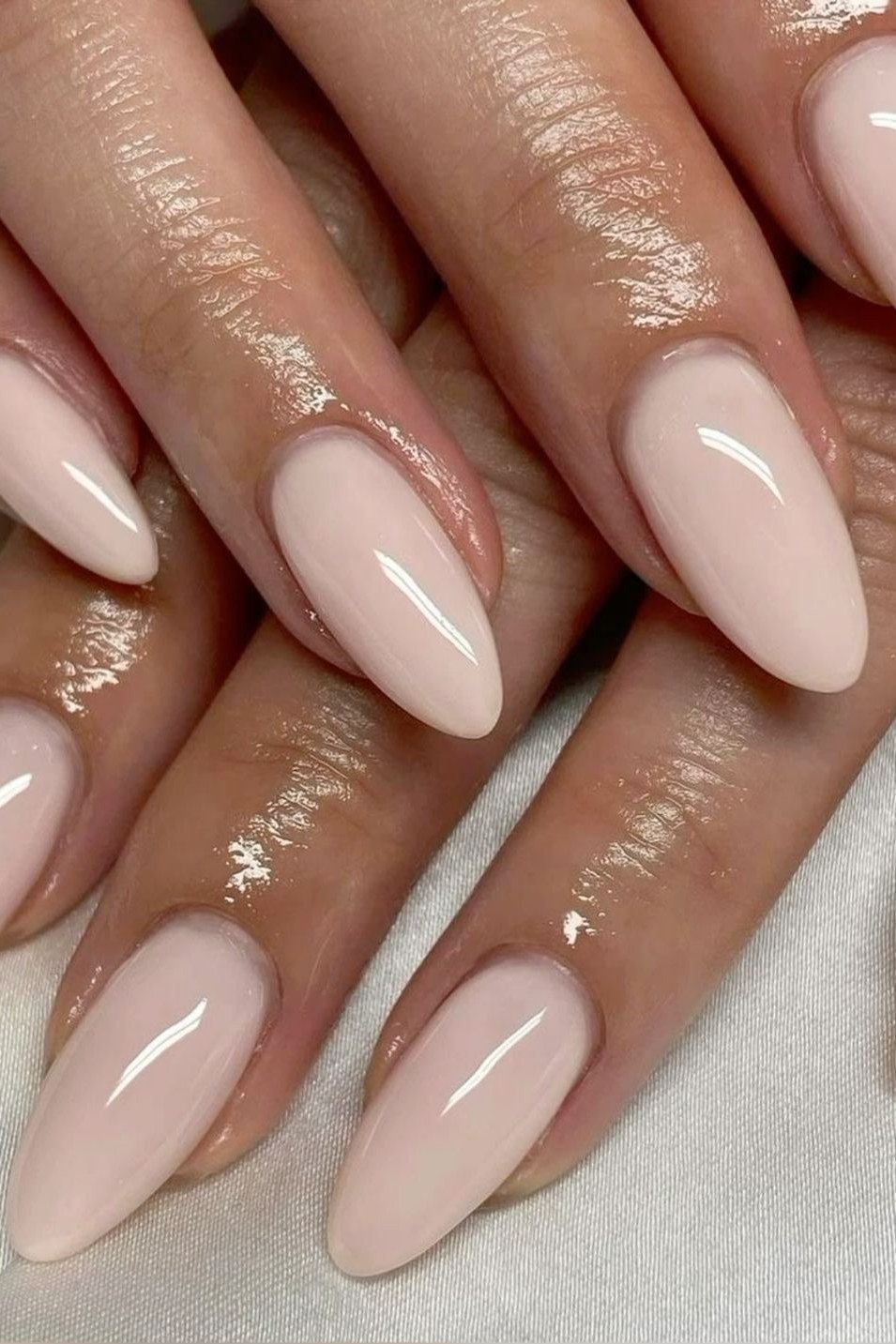 Milky pink almond nails, sophisticated nail design for women over 50