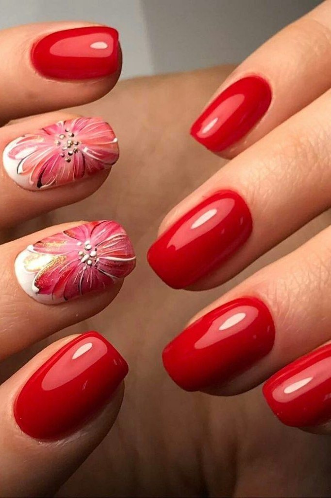 Red Almond with Hand-Painted Florals - elegant nail art idea for mature hands, women over 50