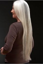 Extremely long platinum ponytail for women over 50