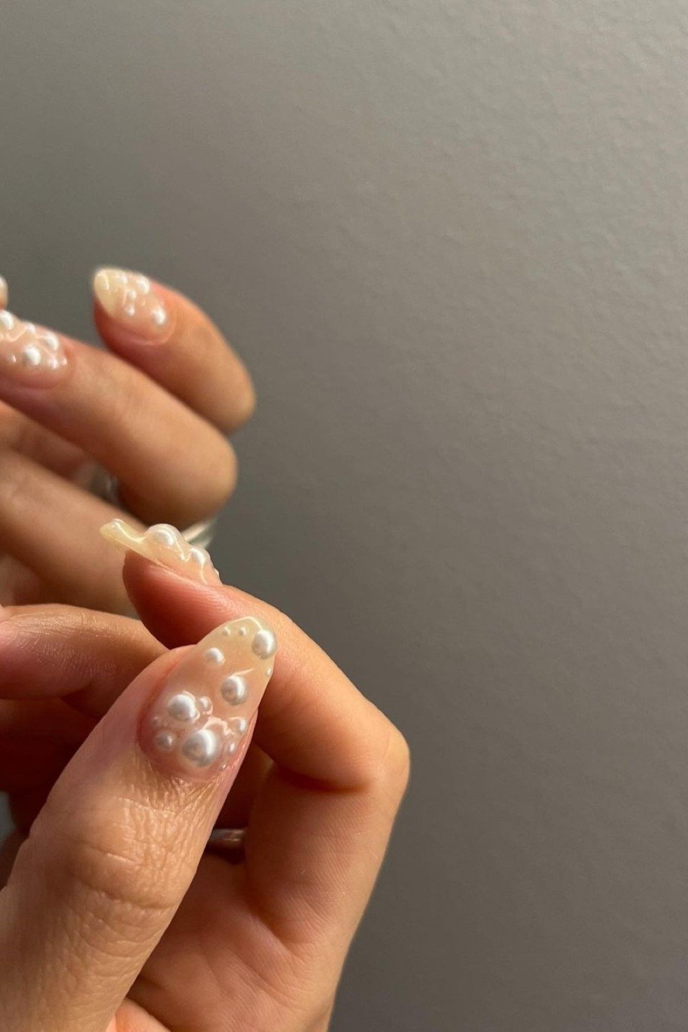 Champagne Pearl Short Nails with Clusters - pearl finish nail idea for women over 60