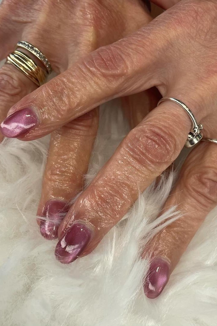 Dusty Rose Cat Eye Nails - Dusty rose pink with soft magnetic shimmer covers these medium length oval nails.