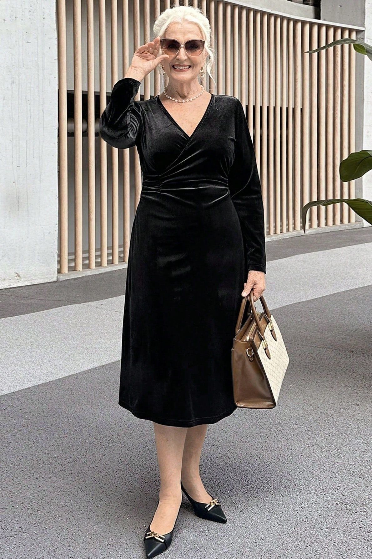 black velvet wrap dress on the street for women over 60