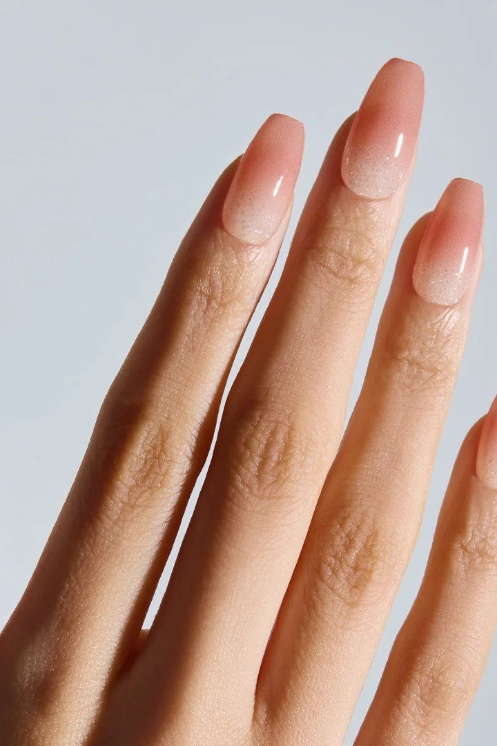 Peachy nude short oval nails