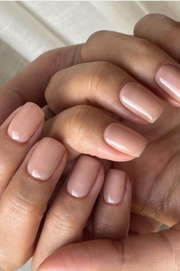 Glossy blush pink hands nails for women over 50