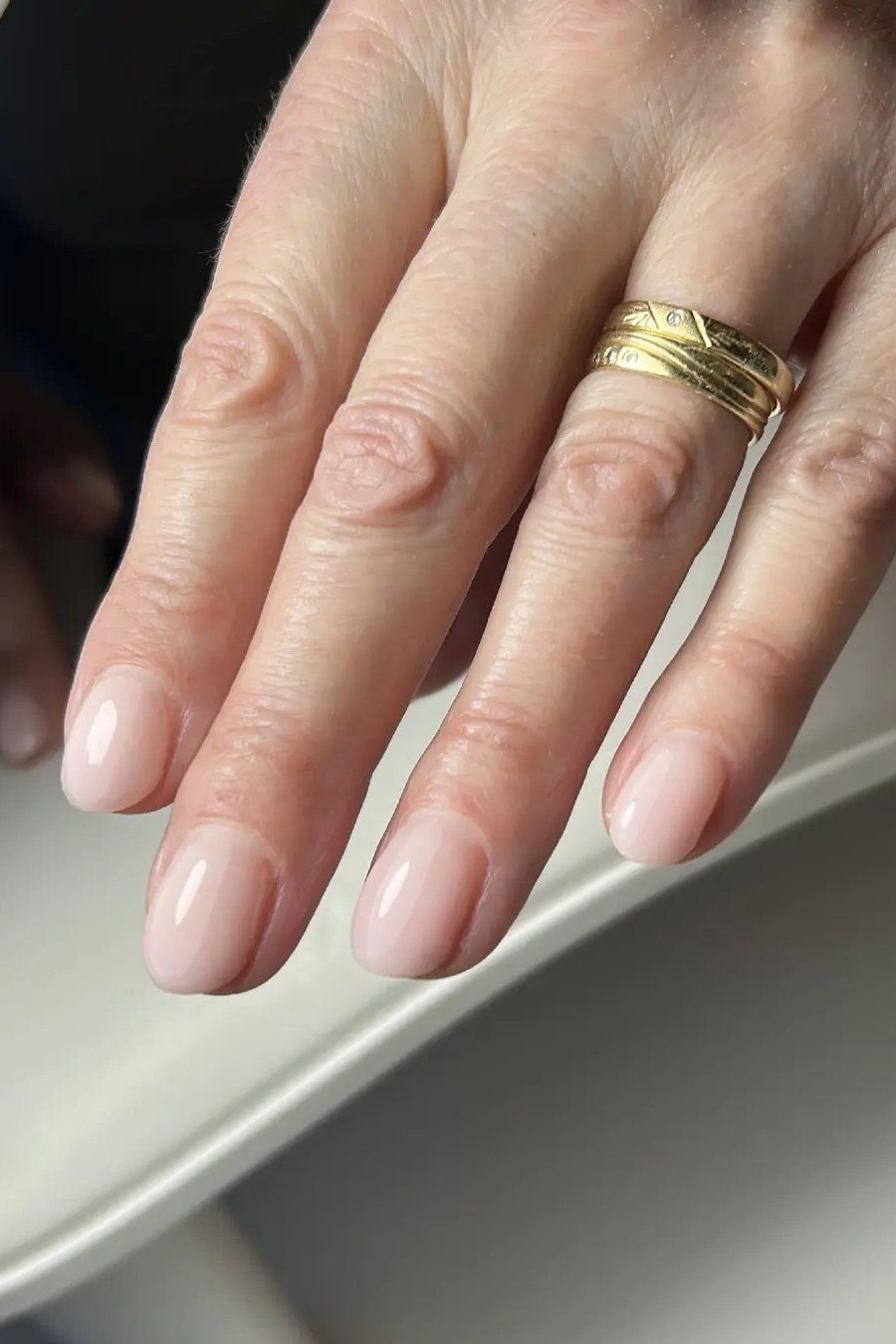 Sheer Nude Almond gel nails for women over 60