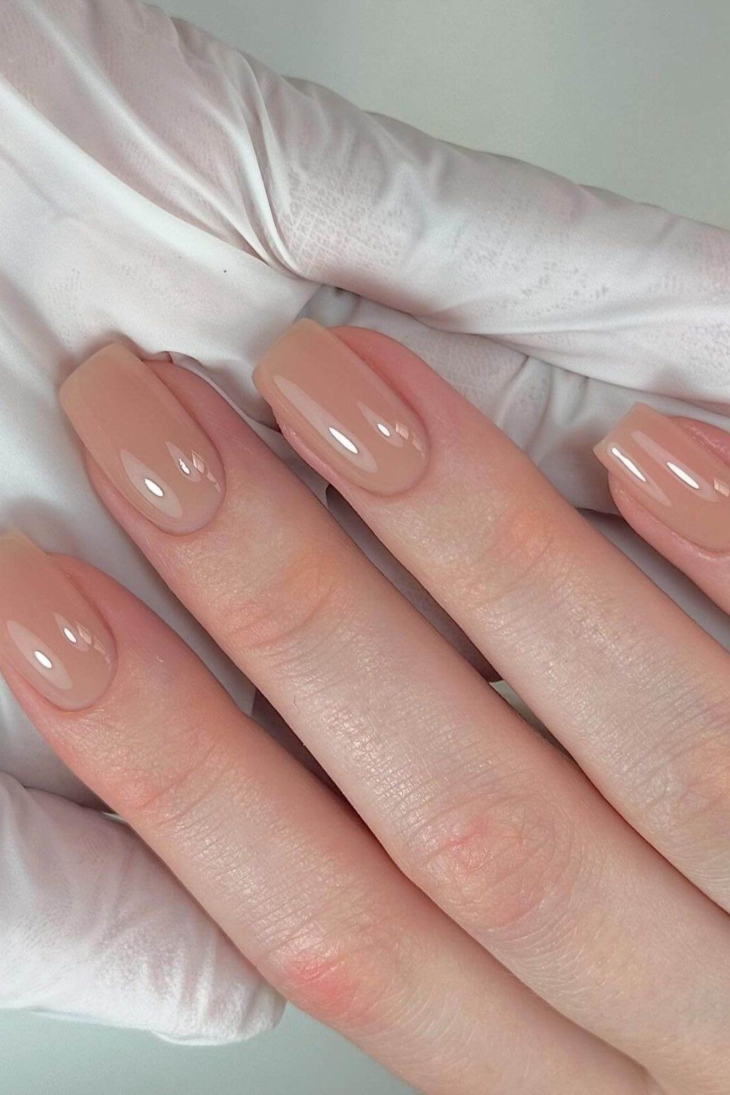 Gold Flake Nude Nails - nude nail art idea for women over 40