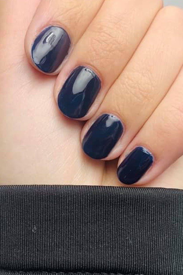 Navy Oval - short nail design for women over 60 that makes nails look longer
