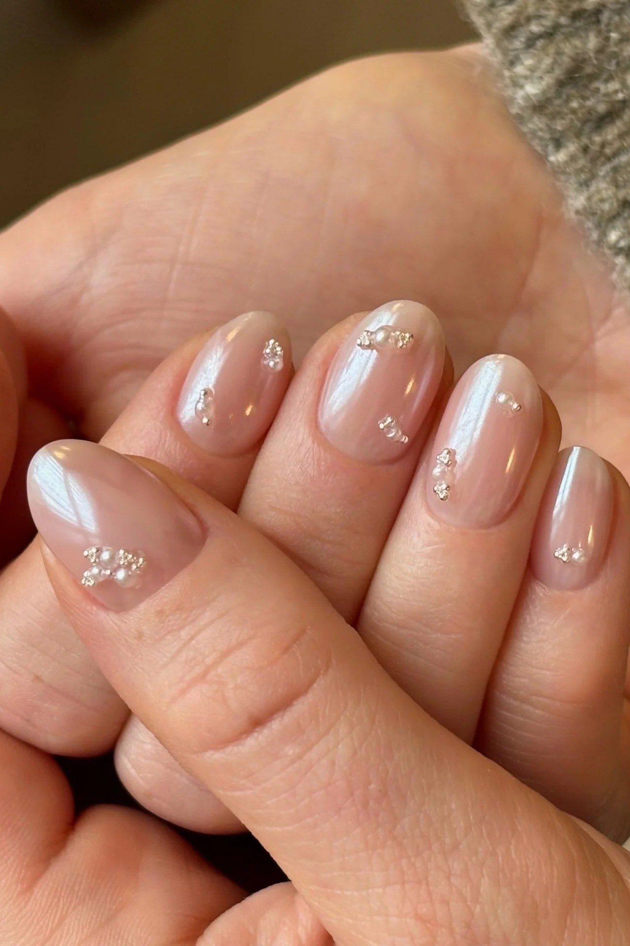 Champagne Sheer Almond Nails with Pearl Dots - pearl finish nail idea for women over 60