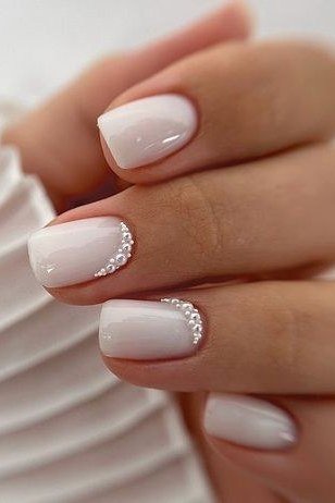 White Nails with Glitter Cuticle Accent, understated glam nail color for women over 60