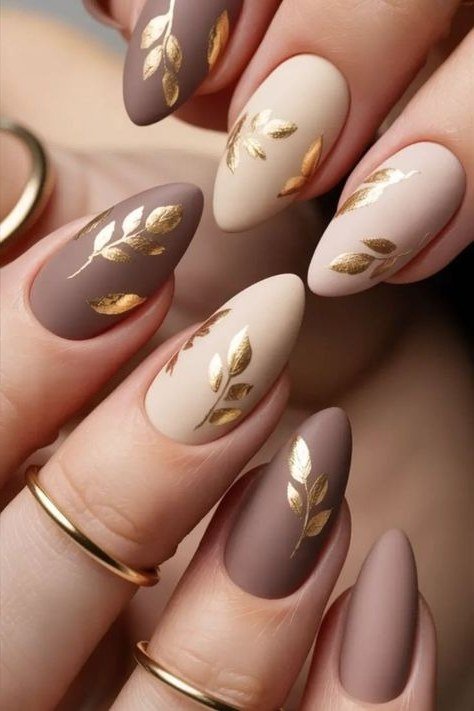 matte taupe nails with gold leaf branch art