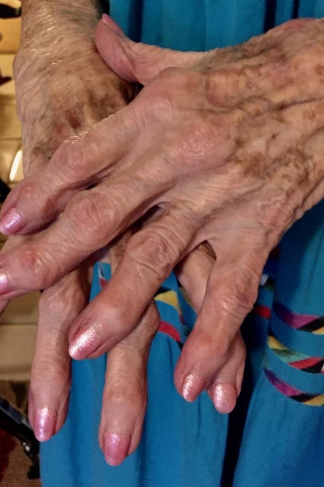 simple sheer pink nails for older hands for older women