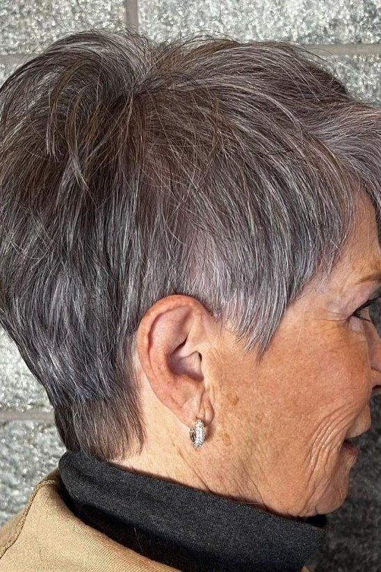 Grey layered pixie, feathered nape, side view for women over 60