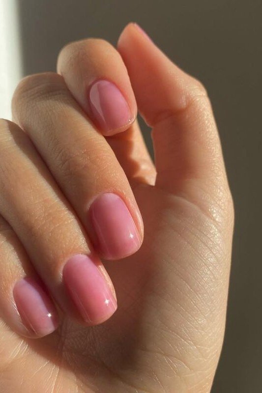 Soft pink medium oval nails