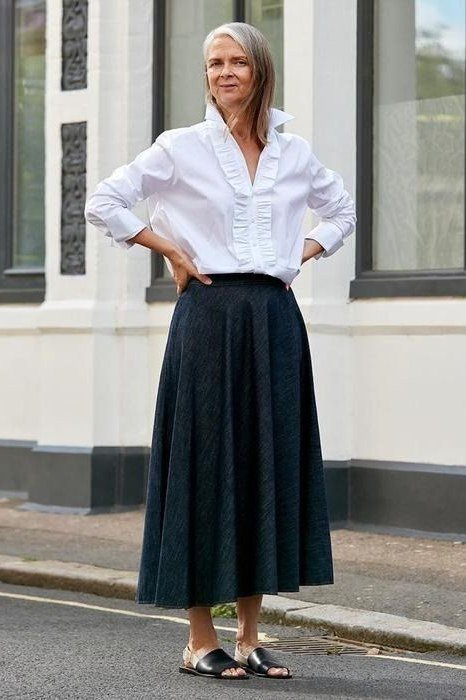 White Ruffled Shirt with a Dark Midi Skirt, classic casual outfit for women over 70