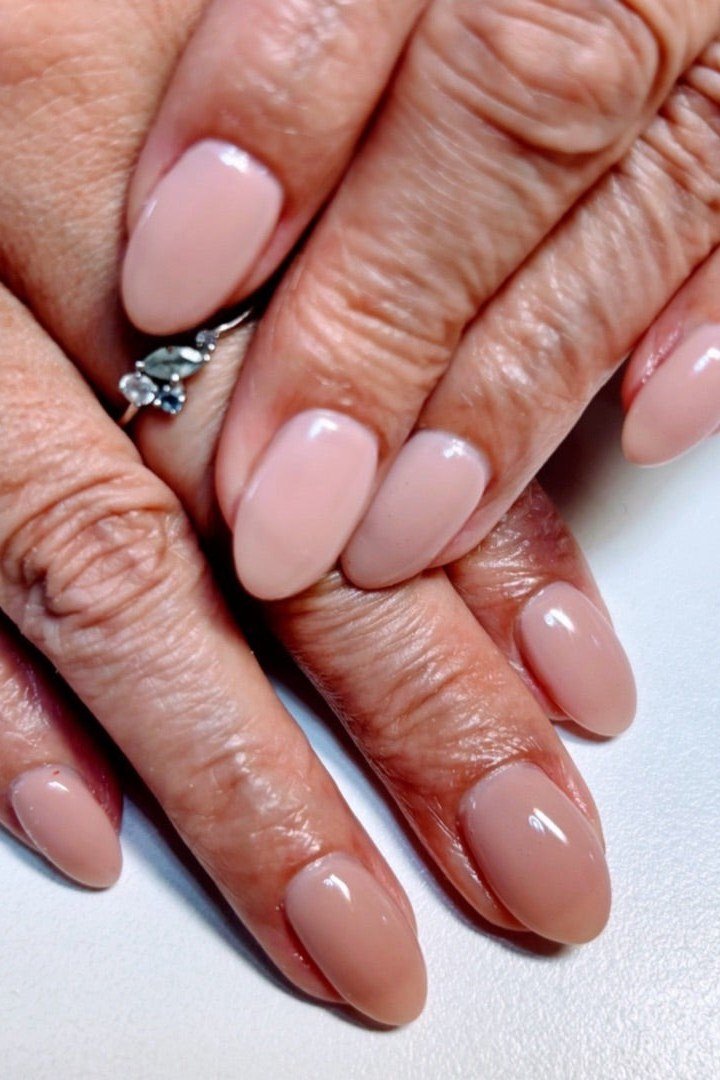 Nude Pink Glossy Manicure for women over 60