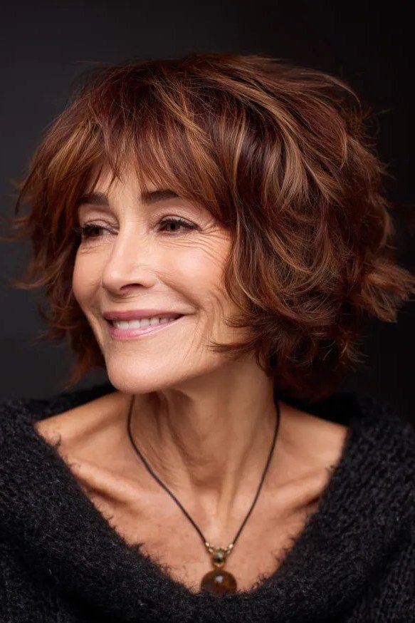 Rich auburn shaggy layered bob with bangs, front view, auburn shaggy bob for women over 50