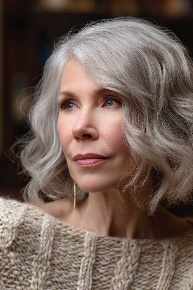 Curly Silver Bob - grey shoulder length hairstyle for women over 60