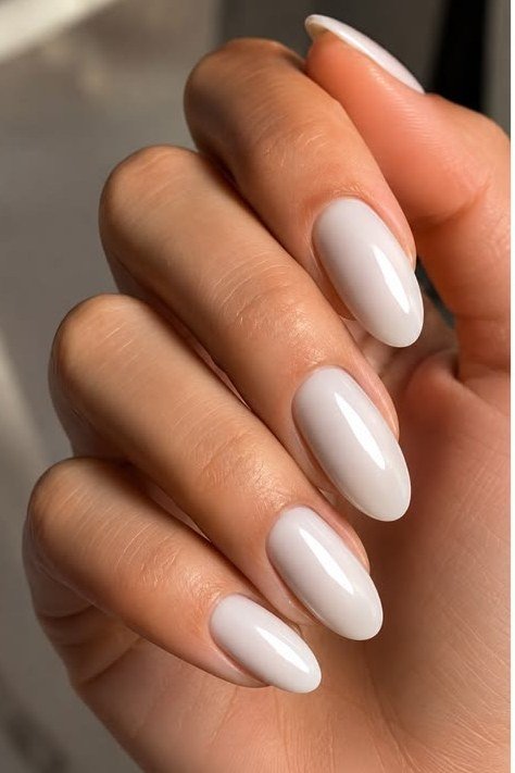 Milky white almond nails, sophisticated nail design for women over 50