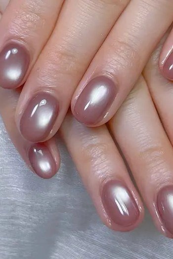 Rose Gold Chrome Almond Nails, elegant mauve nail idea for women over 60