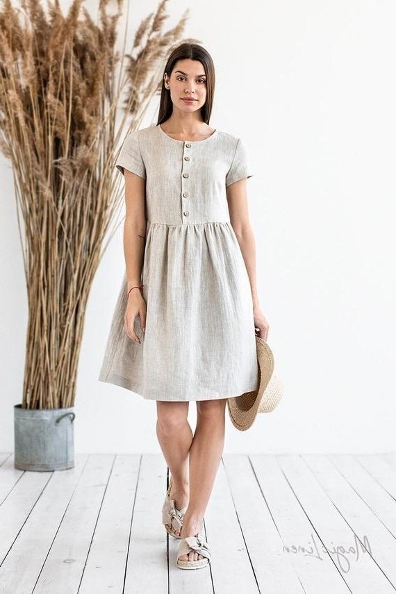 Natural button-front midi dress with straw hat, wheat stalks for women over 60