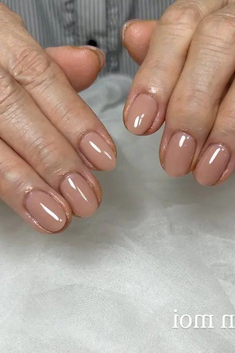 Burgundy wine short oval rich - flattering nail design for older women