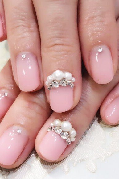 Blush Pink with Pearl Bow - elegant nail art idea for mature hands, women over 50