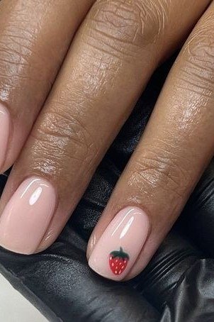 Sheer nude square nails with one strawberry accent nail