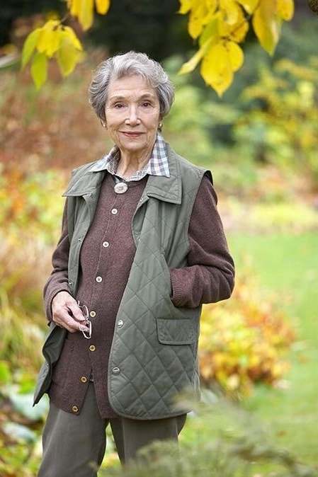 Olive quilted vest outfit for women over 60