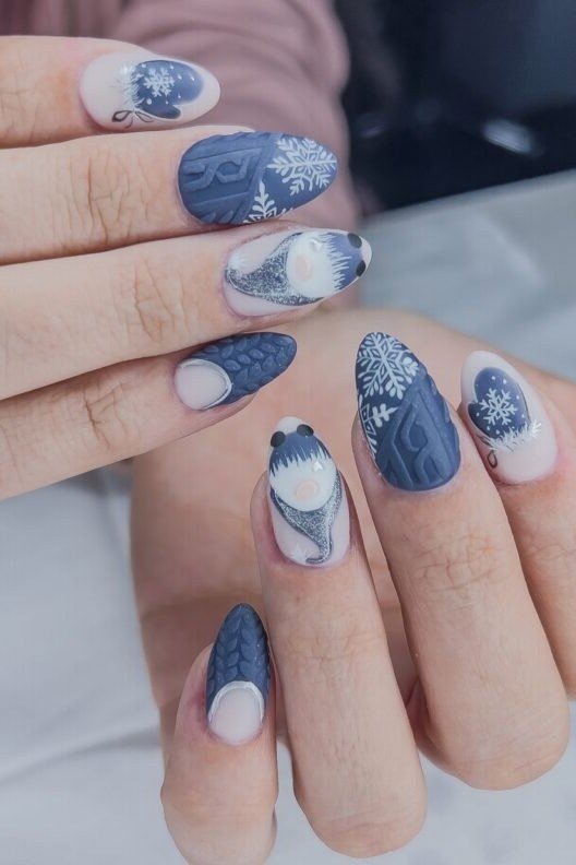 Blue Marble Nails with Snowflakes, fun winter nail idea for women over 60