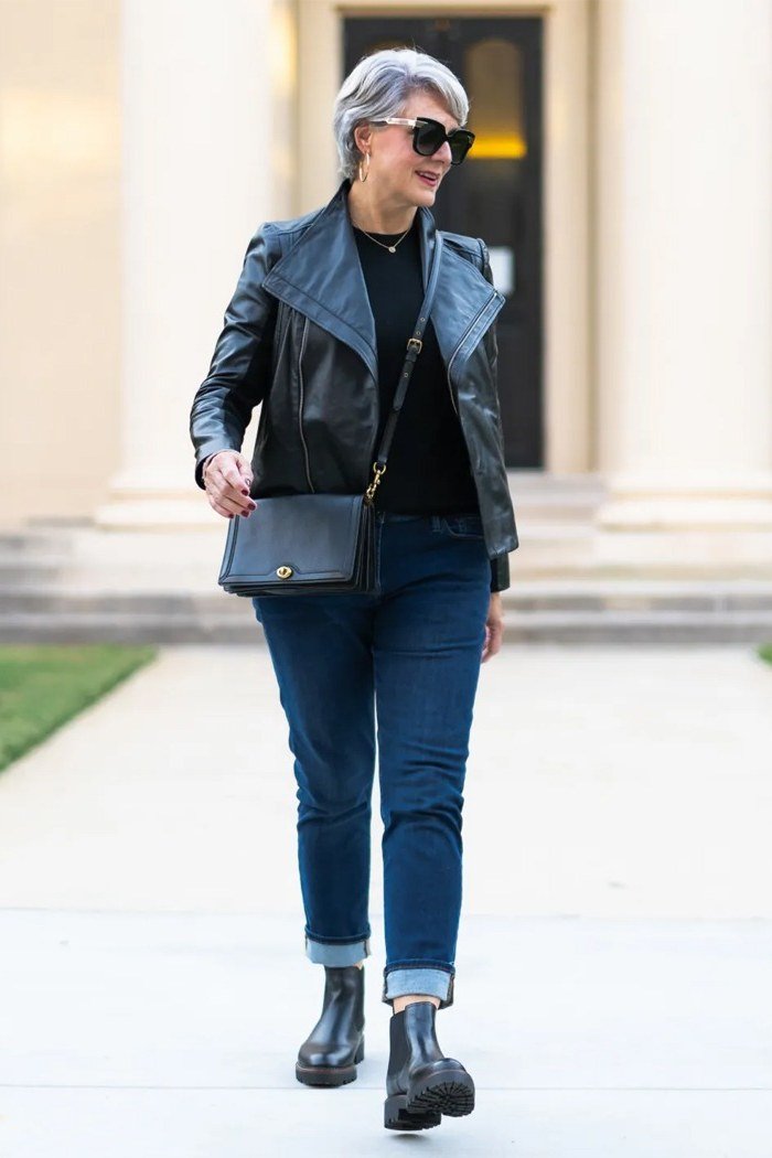 Black leather jacket with jeans and ankle boots fall outfit idea for women over 60