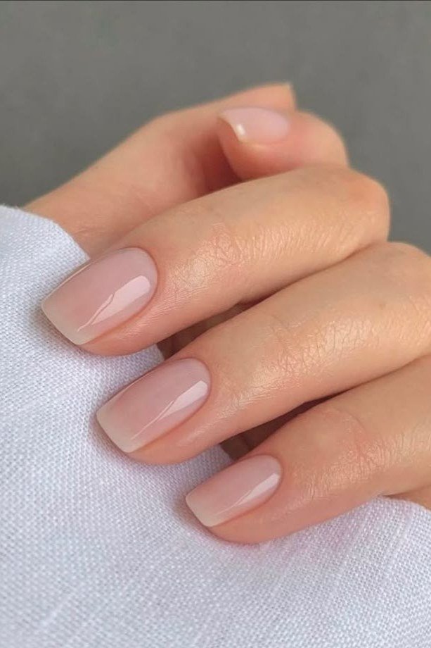 Milky nude nails with white sleeve