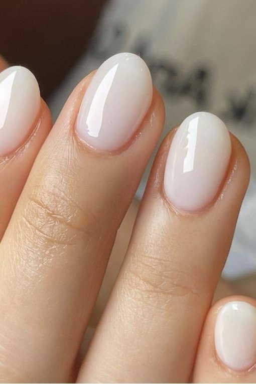 Milky white almond nails, sophisticated nail design for women over 50