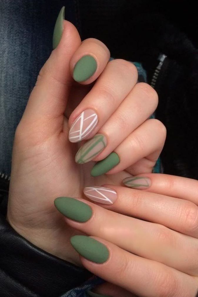 Sage green almond gel nails with white botanical line art, minimal fall design