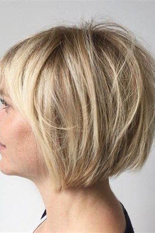 Blonde rounded bob with stacked back - trendy short haircut for older women with fine hair
