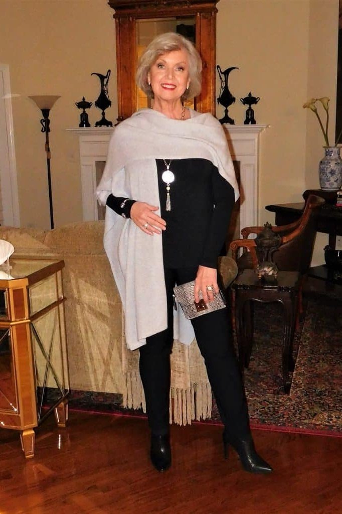 cream fringed shawl with black trousers church outfit for women over 60