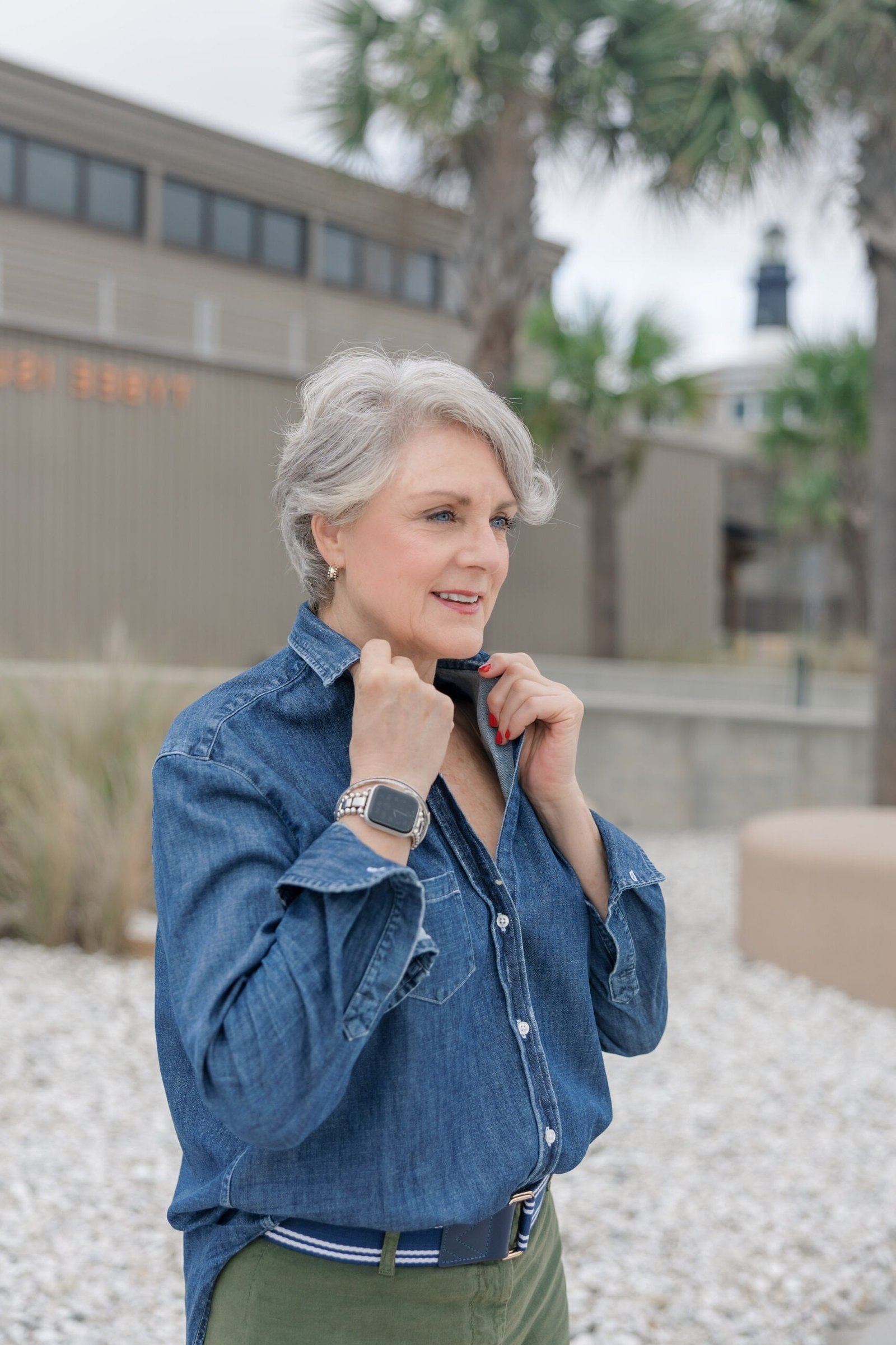 blue chambray shirt olive wide trousers white sneakers women over 50