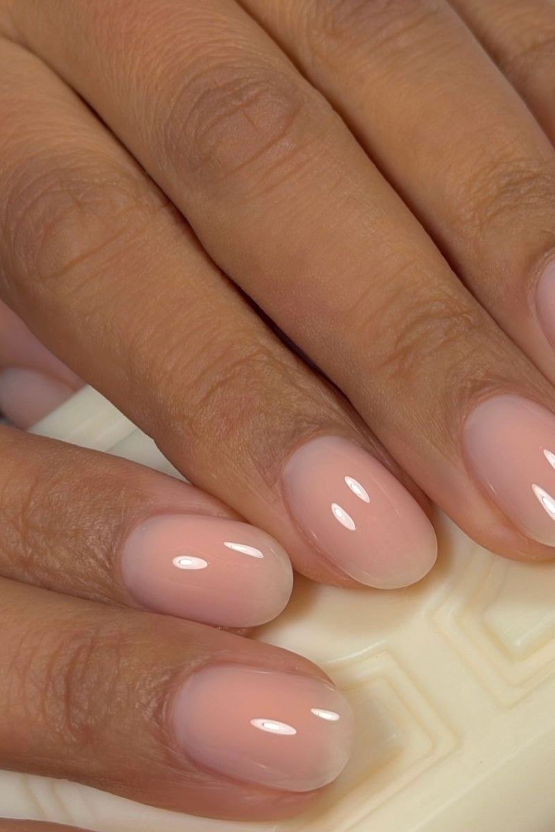 Glossy Nude Pink Almond gel nails for women over 60