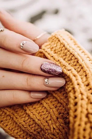 Rose Gold Glitter Accent Almond Nails - winter nail trend for older women over 70