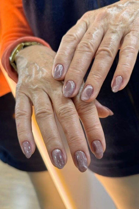 Mauve Nude Cat Eye Nails - Soft mauve nude with fine magnetic shimmer covers these short to medium oval nails.