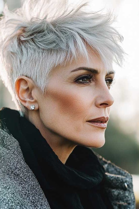 White pixie, three-quarter view, outdoor setting, micro pixie cut for women over 60 going silver