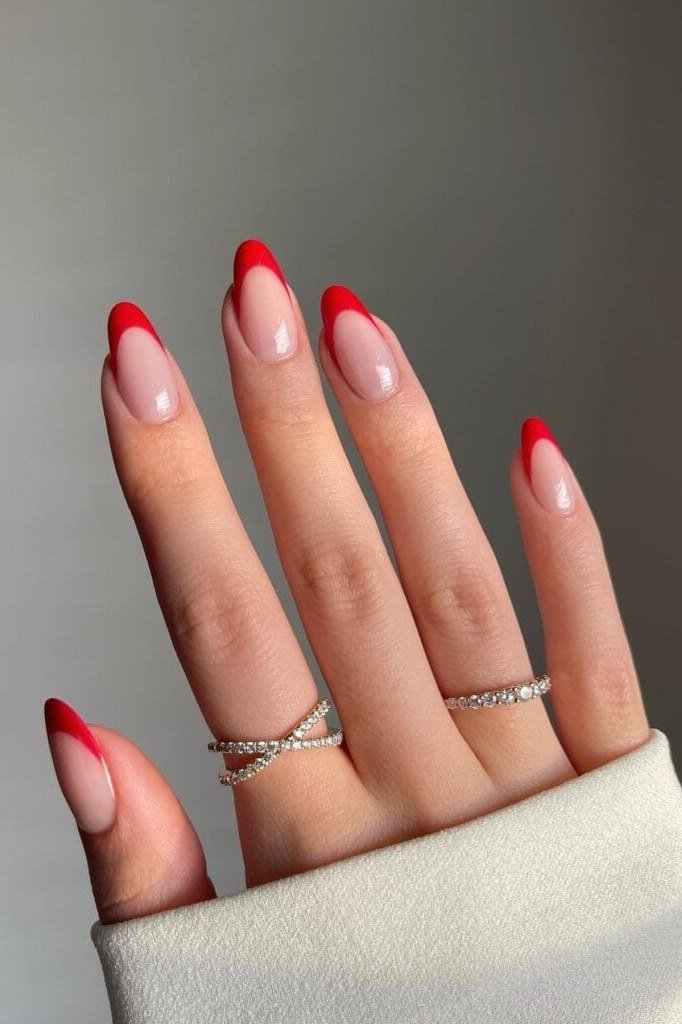 Red-tip French on nude base, elegant two-tone - classy nail design for older women